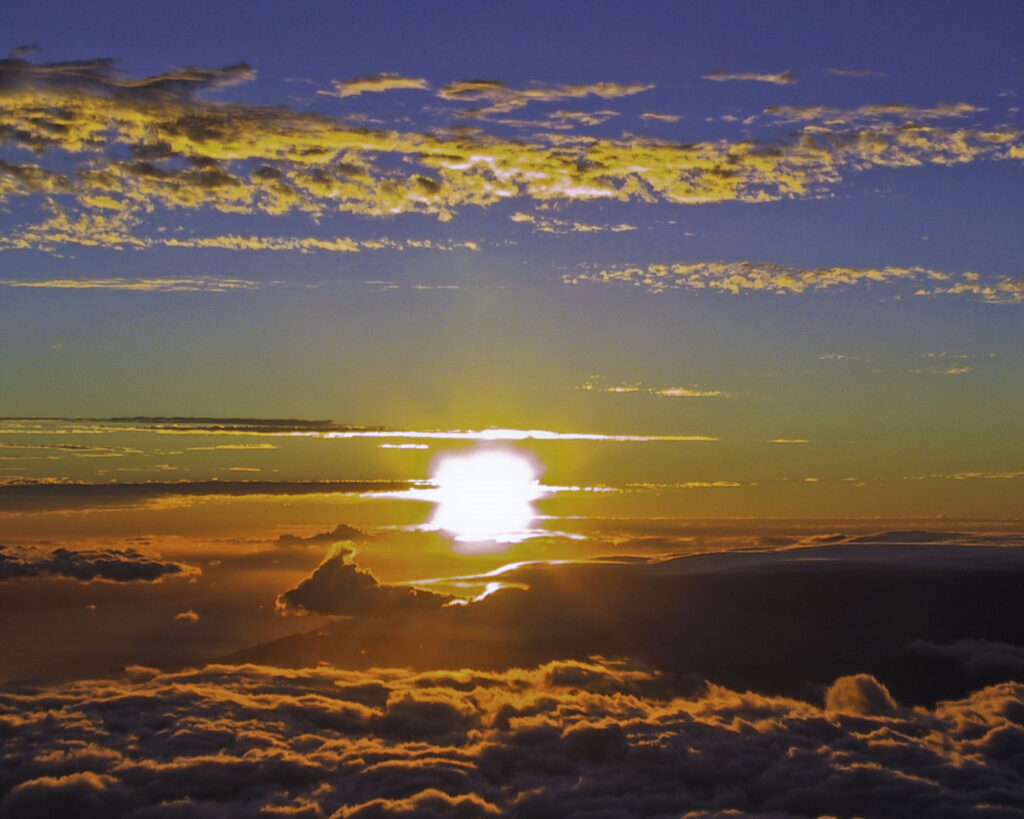 Sunset from the peak of Haleakalā, in Haleakalā National Park, Maui, Hawaii.