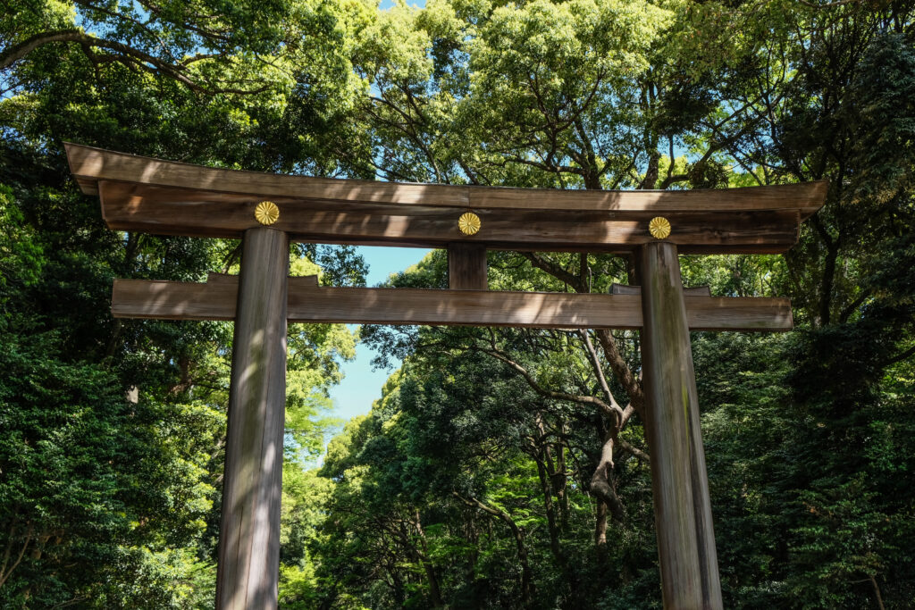 A large wooden Torii gate leading to the Meiji Jingu, in Tokyo.