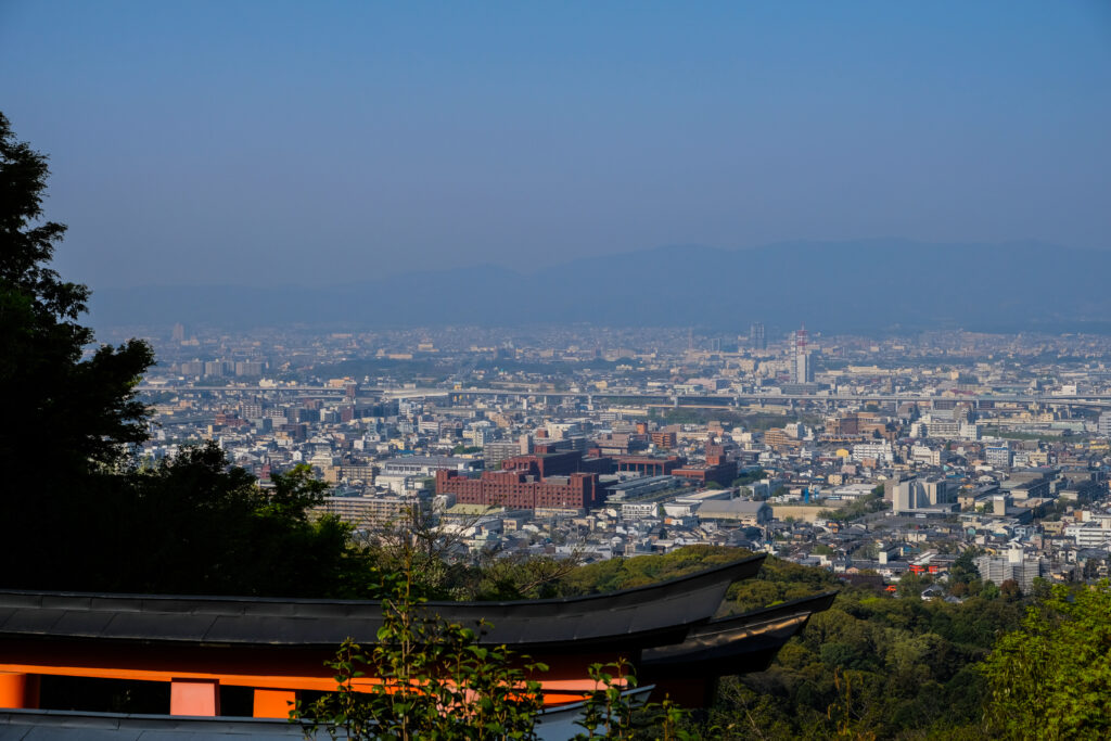 Looking out over the city of Kyoto from halfway up Mt. Inari.