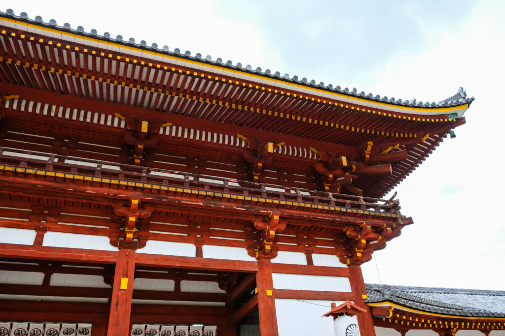 Red wood and white panels with a fresh roof on a temple near the Todaiji temple in Nara, Japan.