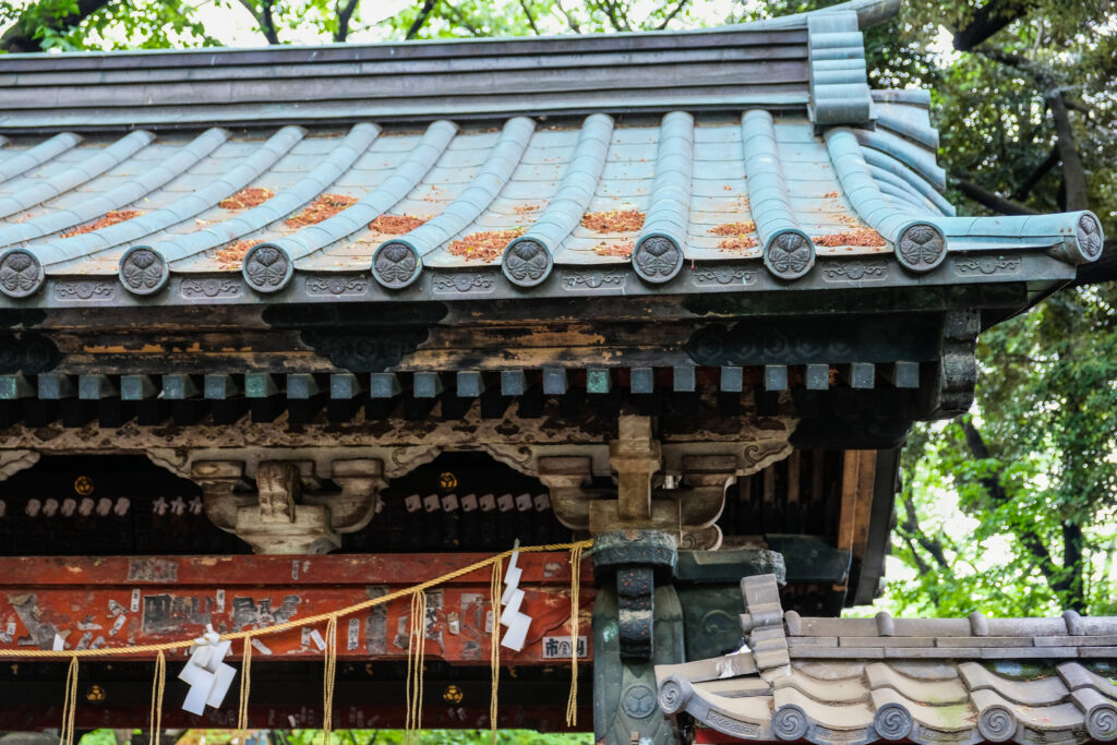 A blue-green roof of a small shrine in Ueno Park.