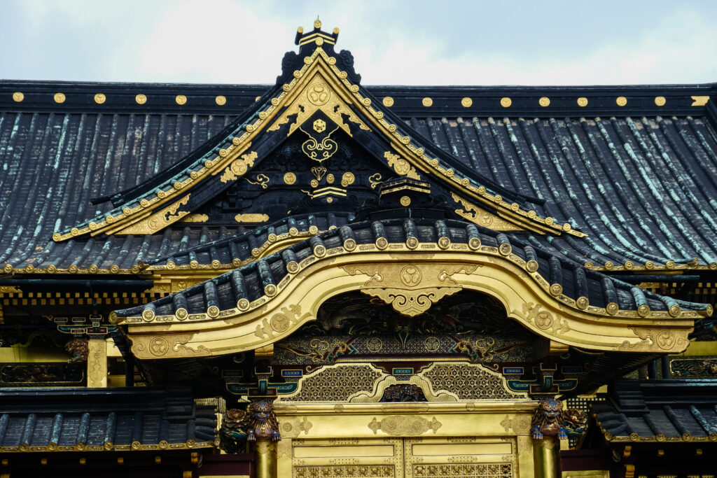 A black and gold roof for a temple in Ueno Park.