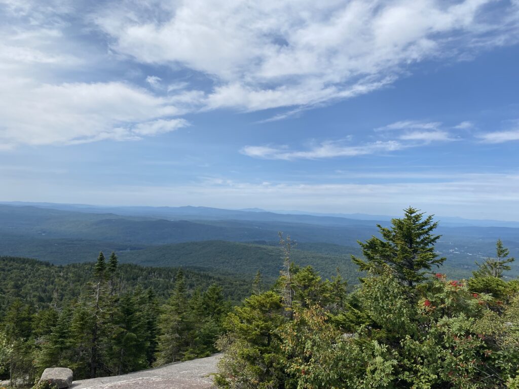 At tree-line on Mt Cardigan, looking southwest-ish at hills in the distance.